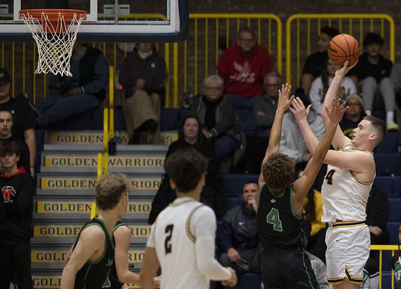 Sterling’s Lucas Austin puts up a shot against Rock Falls Tuesday, Nov. 29, 2022.