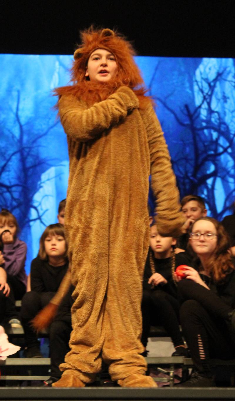 The Cowardly Lion (Bentley Lurz) sings of his desire for courage Friday, March 22, 2024, during the Streator Elementary Schools production of "The Wizard of Oz – Youth Edition" at Streator High School.