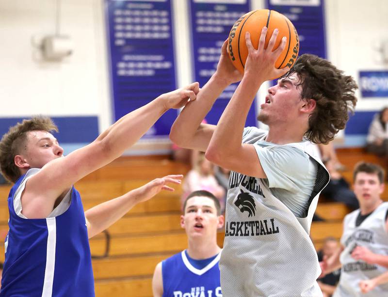 Indian Creek’s Logan Schrader shoots over Hinckley Big Rock’s Luke Badal Monday, June 9, 2025, during their summer game at Hinckley-Big Rock High School.