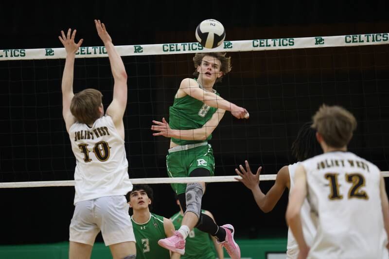 Providence’s Hayden Hill hits a shot against Joliet West on Tuesday, April 16, 2024 in New Lenox.