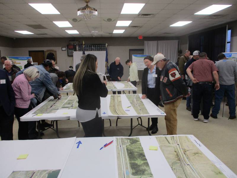 People gather at an open house on Thursday, March 21, for proposed improvements on the Route 53 corridor from Joliet to Wilmington.