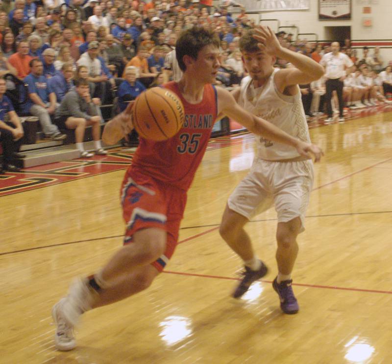 Pecatonica's Parker Krogman gets the ball under the basket. The Eastland Cougars faced the Pecatonica Indians in Friday’s Class 1A Orion Sectional final at Orion High School on March 6, 2026. Eastland won the game 48-41.
