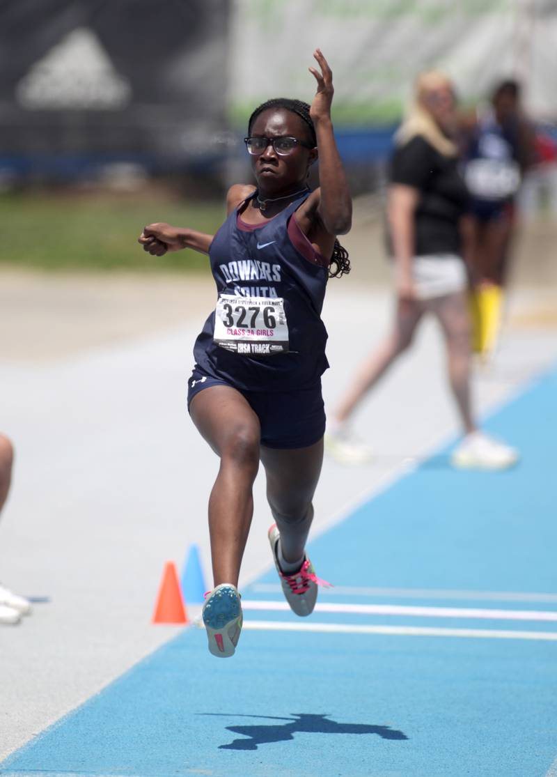 Downers Grove South’s Karen Boakye competes in the 3A triple jump during the IHSA State Track and Field Finals at Eastern Illinois University in Charleston on Saturday, May 20, 2023.