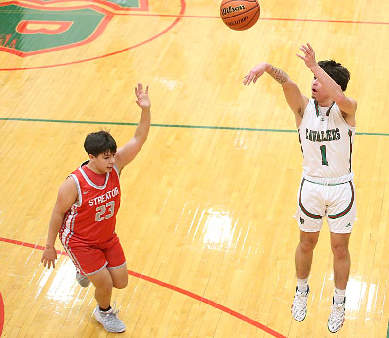 L-P's London Cabrera shoots a wide-open jump shot over Streator's Logan Aukland on Thursday, Jan. 28, 2023 at L-P High School.