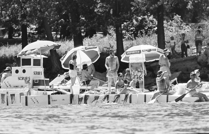 The Anything That Floats races were held from 1978-1986 each year in Peru. Contestants received a free case of Old Style beer upon entering. The rules were simple. To enter, participants needed to build a raft less than 50 feet in length and each person had to have a life jacket on board whether you wore it or not. A rope had to be attached to the raft for towing. Rafts were made from styrofoam, inter tubes or barrels. A minimum of two paddles were required on the float. Rafts were launched at the Starved Rock Boat Ramp and finished at the Peru boat launch area. Over time, the event grew and got to big and out of control that organizers had to scrap it. This photo was found in the La Salle NewsTribune archives.