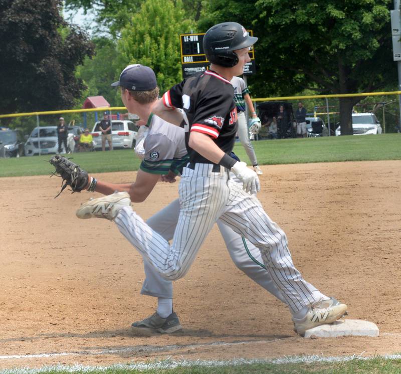 Fulton's Dane Van Zuiden tries to beat the throw to first after laying down a sacrifice bunt against River Ridge/Scales Mound's at the 1A Lena-Winslow Sectional final on Saturday, May 31, 2025.