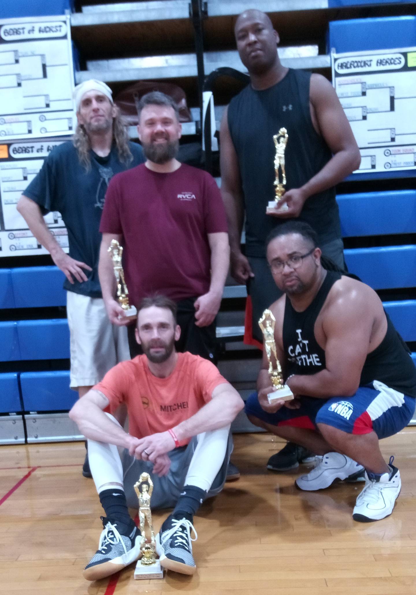 Eric Harris, Dustin Nelson, Maurile Bell, Drew Carskaden, and Larmar Lewis are members of the Hoopahollies, which went 23-1 and won the 40-and-older Coloma Township Park District Fall Basketball League.