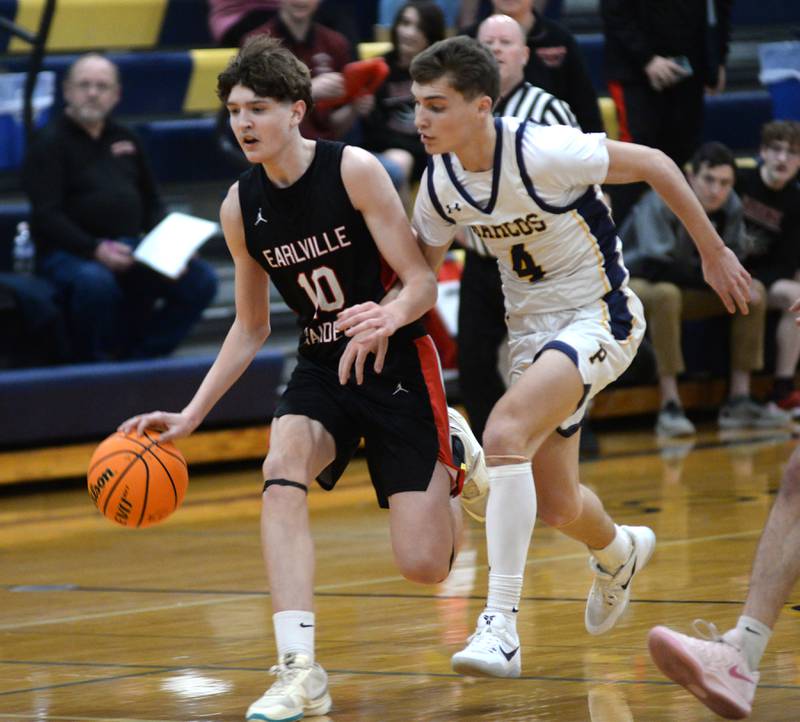 Earlville's Easton Fruit (10) dribbles ahead of Polo's Mercer Mumford (4) during a Monday, Feb. 10, 2025 game at Polo High School.