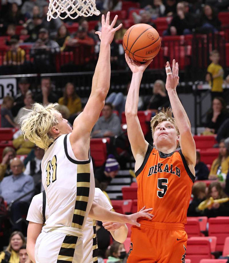 DeKalb's Tyler Vilet shoots over Sycamore's Burke Gautcher during the First National Challenge Friday, Jan. 27, 2023, at The Convocation Center on the campus of Northern Illinois University in DeKalb.