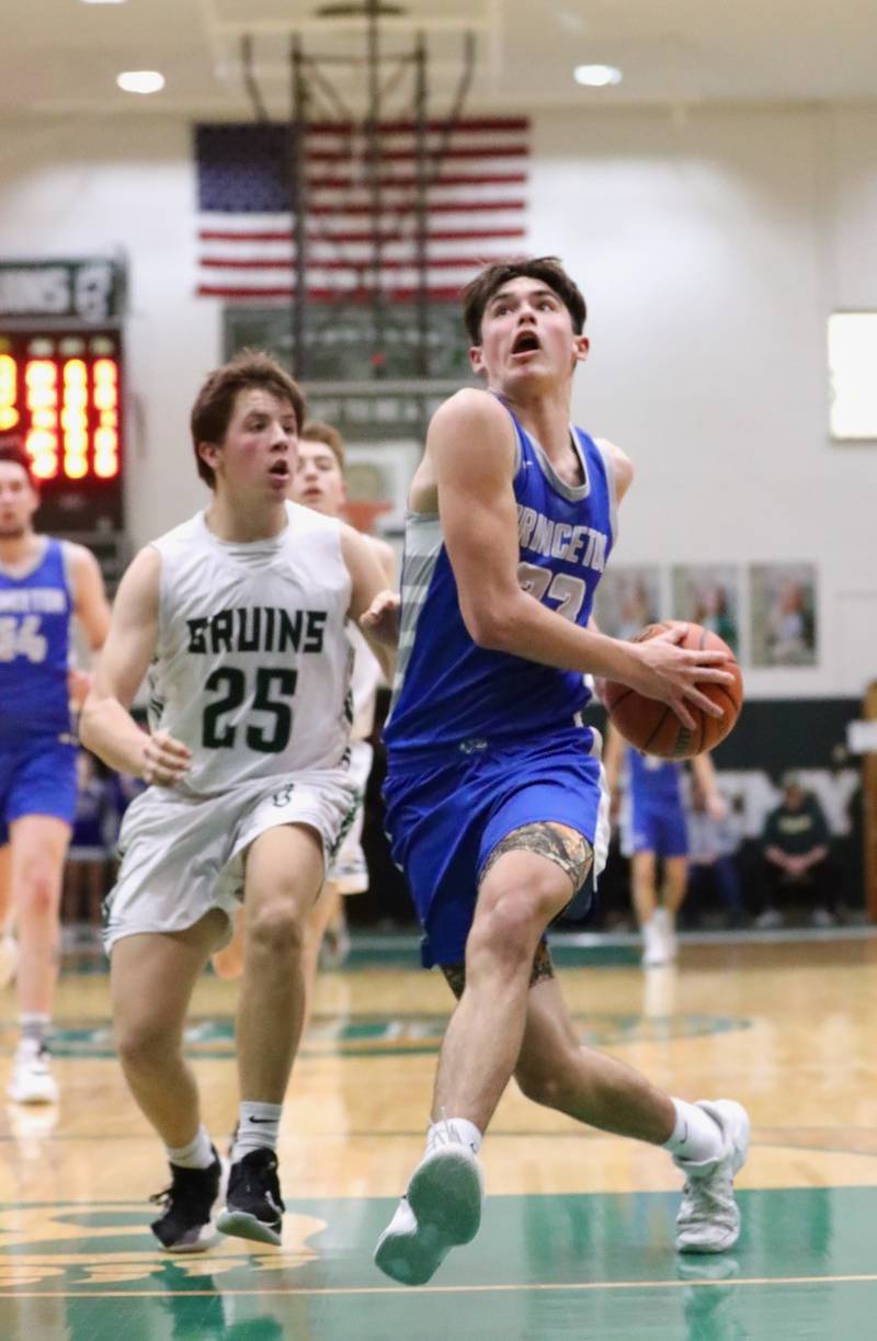 Princeton's Noah LaPorte gets past St. Bede's Logan Potthoff for a first-half basket at St. Bede Friday.