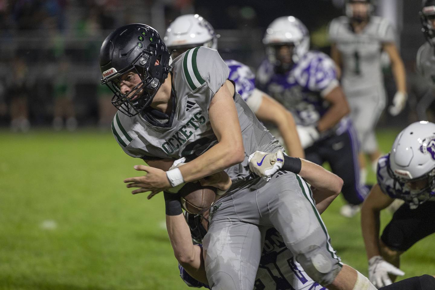 Rock Falls’ Cooper South is stripped of the ball by Dixon’s Braxton Bruce Friday, Sept. 12, 2025.