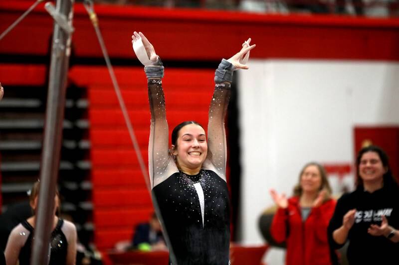 Lincoln-Way East’s Alaina Lekki competes on the uneven bars during the Hinsdale Central Sectional on Monday, Feb. 10, 2025 in Hinsdale.