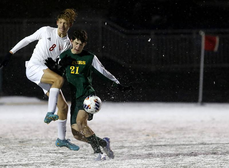 Timothy Christian's Trevor Munk tries to kick the ball away from Crystal Lake South's Anthony Pupillo during the IHSA Class 2A Grayslake Central Supersectional soccer match on Tuesday, Oct. 31, 2023, at Grayslake Central High School.