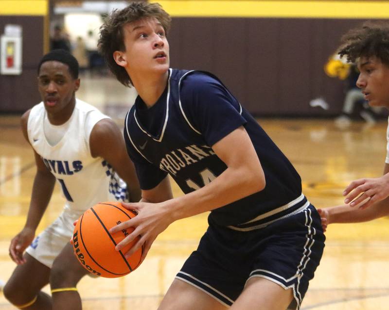 Cary-Grove’s Evan Bauer works under the hoop against Larkin in varsity boys basketball Hinkle Holiday Classic action on Friday, Dec. 26, 2025, at Jacobs High School in Algonquin.