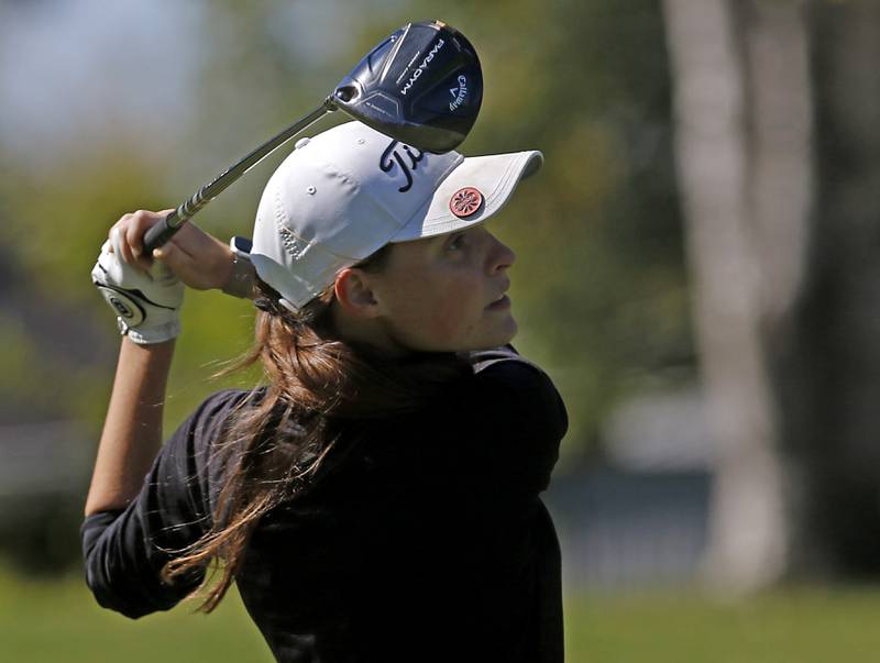 McHenry’s Kilynn Axelson watches her tee shot on the second hole during the IHSA Class 2A Huntley Girls Golf Regional on Tuesday, Oct. 1, 2024, at Pinecrest Golf Club in Huntley.