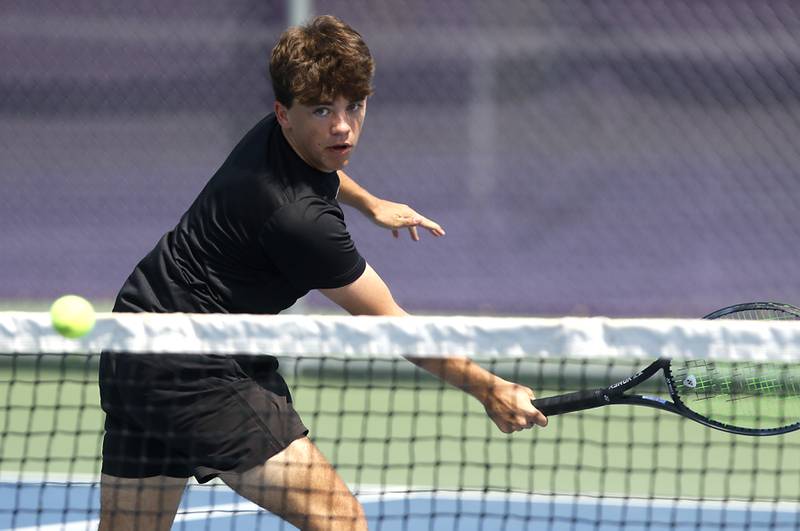 Richmond-Burton’s Connor Trepanier returns the ball as he competes in the Class 1A Boys Doubles State Tennis Tournament on Thursday, May 23, 2024, at Rolling Meadows High School in Rolling Meadows.