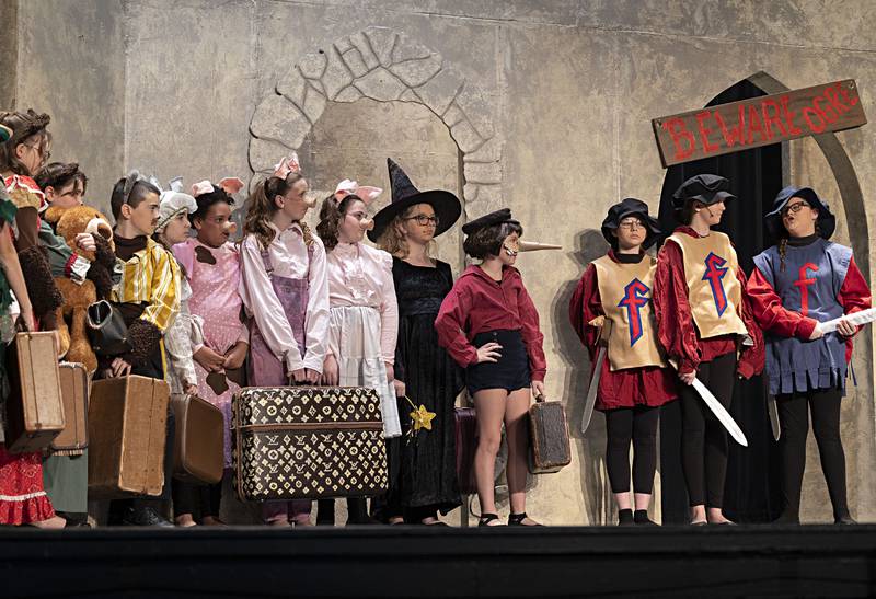 A cast of fairy tale characters take the stage during rehearsal of Woodlawn Arts Academy’s “Shrek the Musical Jr.” rehearse Thursday, Jan. 11, 2024 at Dixon High School.