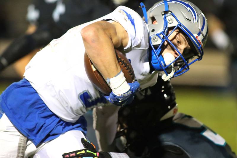 Woodstock’s Jared Kay runs the ball in varsity football at Woodstock North High School on Friday, October 24, 2025.