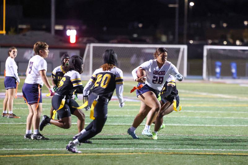 Oswego's Nathalia Wheeler runs the ball during the Panthers' 13-7 victory over Joliet West on Tuesday, Oct. 7,