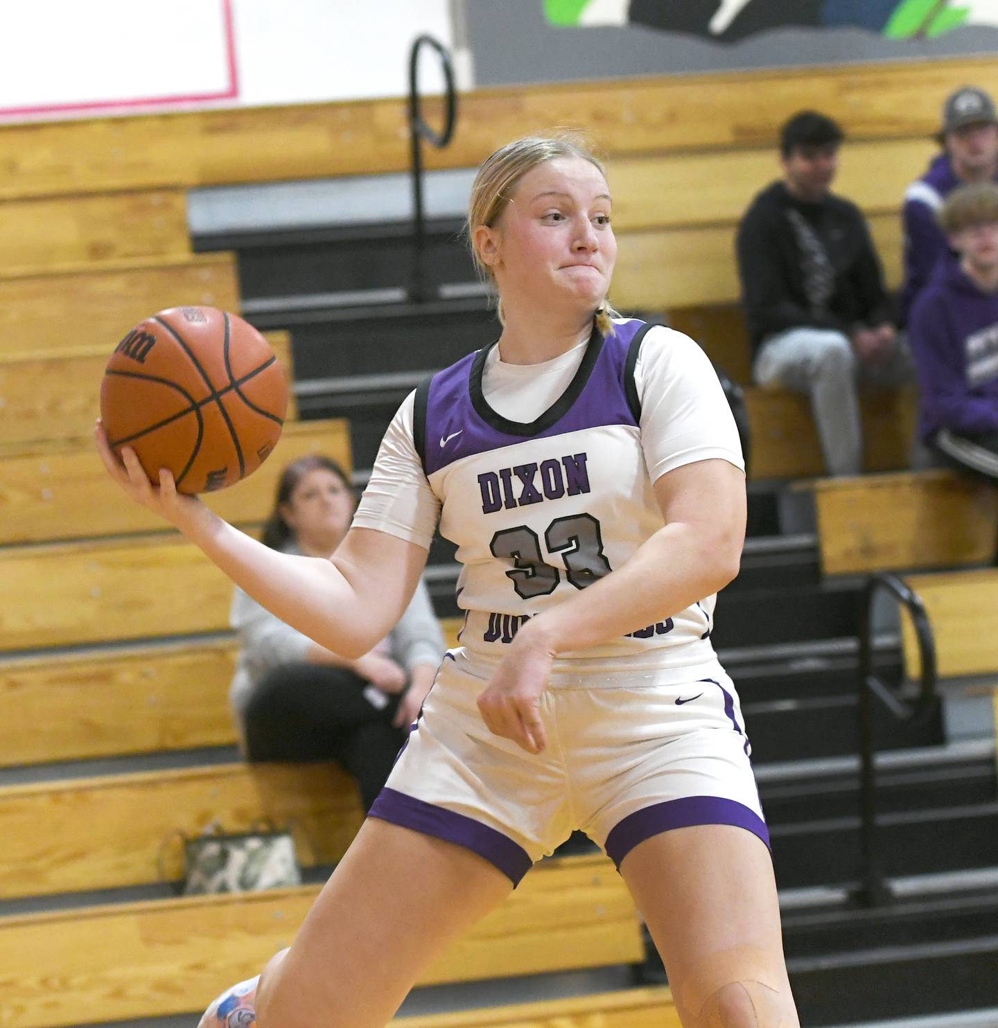 Dixon's Jessica Pitman looks to pass to a teammate as she saves the ball from going out of bounds against Mendota at the Oregon Tip Off Tournament on Wednesday, Nov. 26.