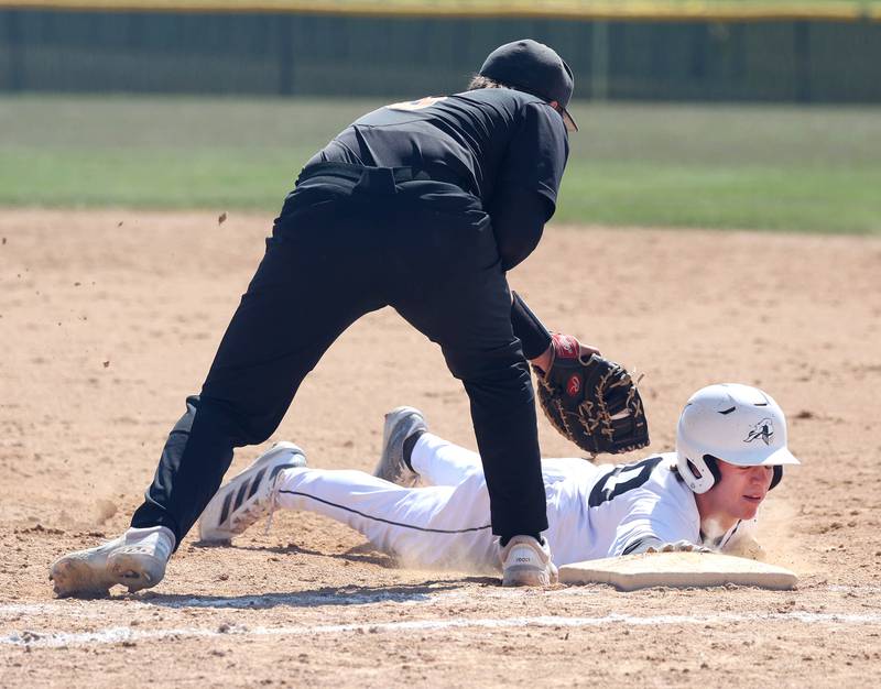 Kaneland's Brady Alstott is nearby picked off as DeKalb's Paul Kakoliris applies the tag just late during their game Saturday, April 12, 2025, at Kaneland High School in Maple Park.