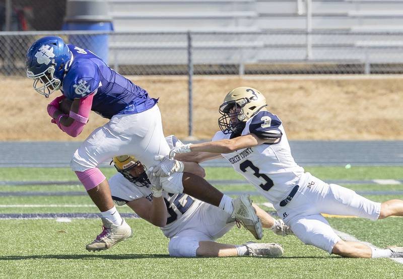 Newman’s Tyson Williams fights for yards against Mercer County Saturday, October 4, 2025.