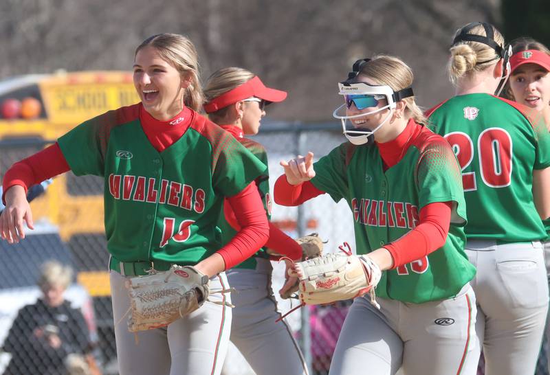 L-P's Kelsey Frederick and teammate Shayla Turczyn smile after breaking the huddle on the mound against Princeton on Tuesday, March 24, 2026 at Little Sibera Field in Princeton.