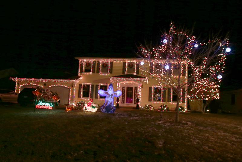 This home features an inflatable Will Ferrell inflatable Christmas decoration on Tuesday, Dec. 20, 2022 located 1606 28th Street in Peru.