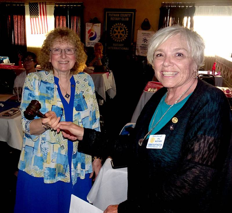 Adriane Shore was installed as president of the Putnam County Rotary after receiving the gavel, president’s pin and a gift from outgoing President Debbie Buffington.