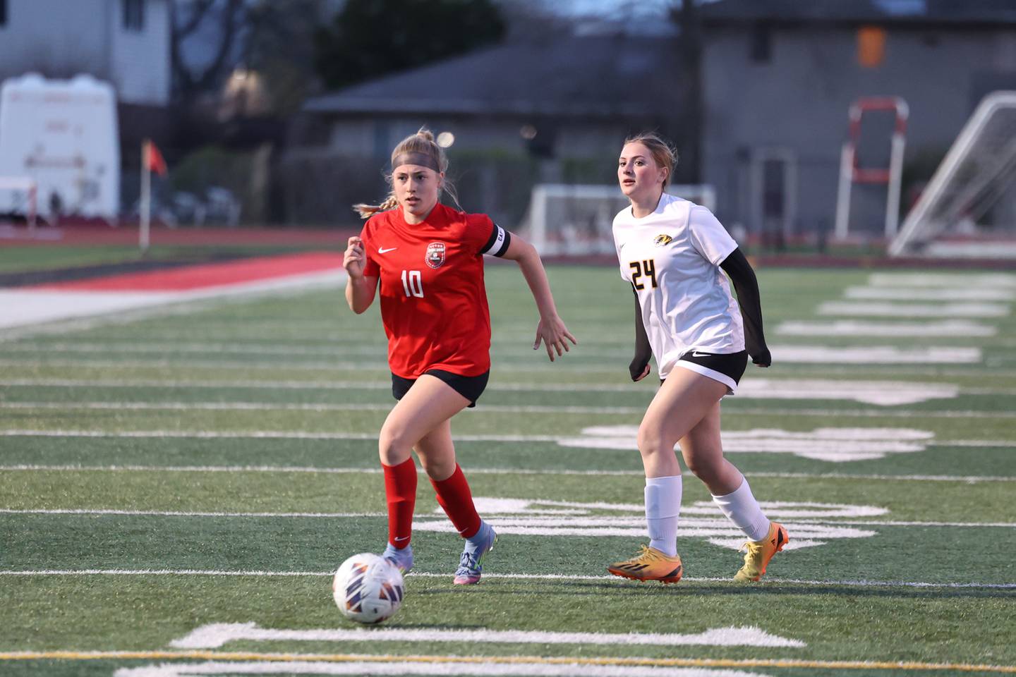 Bradley-Bourbonnais' Harper Tollefson advances past a Herscher defender during Bradley-Bourbonnais' 4-3 victory on Monday, April 6, 2026.