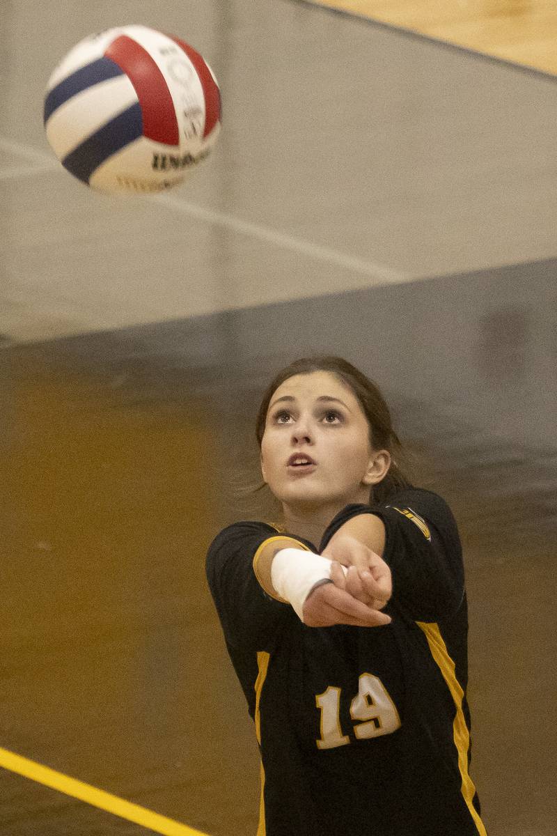 Avery Mountray returns a serve against St. Bede during the game on September 21, 2023 at Putnam County High School.