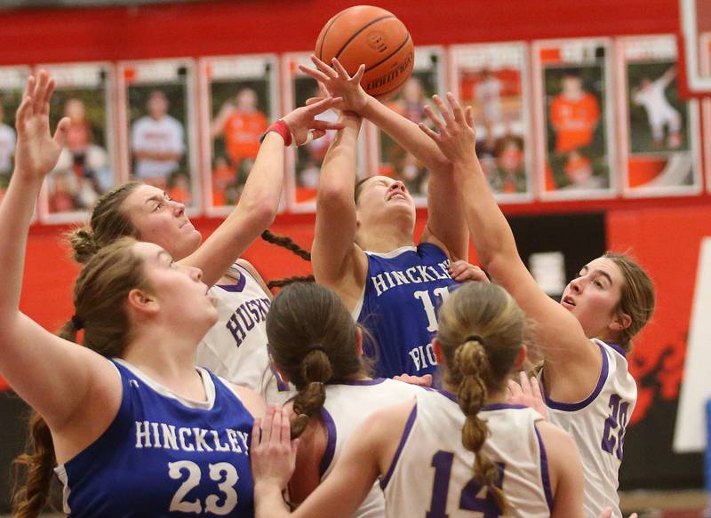 Hinckley-Big Rock's Raven Wagner (center) has the ball tipped away from her by Serena's Kendall Whiteaker and teammate RayElle Brennan during the Little Ten Conference championship game on Friday, Jan. 24, 2025 at Earlville High School.