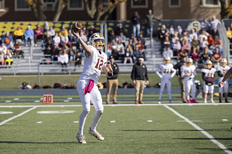 ROWVA’s Riley Dinner fires a pass against Newman Saturday, Oct. 28, 2023 in the Class 1A playoffs in Sterling.