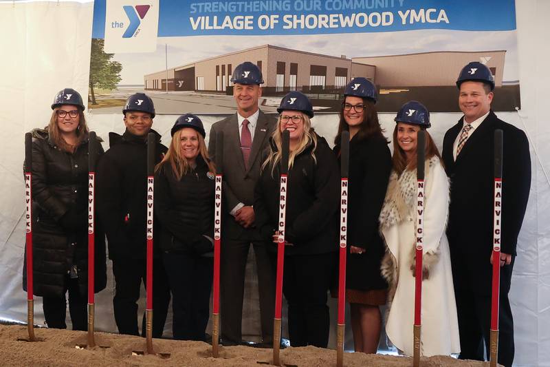 Elected officials and members of the YMCA pose for a photo at the Village of Shorewood YCMA groundbreaking ceremony on Thursday, Nov. 21, 2024 in Shorewood.
