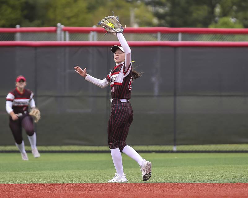 Yorkville's Destiny Barton (00) catches a pop up to short during softball game between Oswego at Yorkville. May 5, 2026 in Yorkville.
