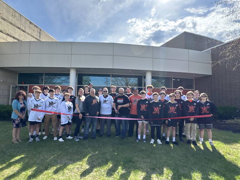 On April 23 the Channahon Minooka Chamber/Grundy Chamber celebrated the new Minooka Hockey Club with a ribbon cutting with Mayor Ric Offerman. Offerman received a Minooka Hockey jersey from the team at the event. The Minooka Hockey Club formally started in January 2025 and has more than 35 student athletes enrolled.