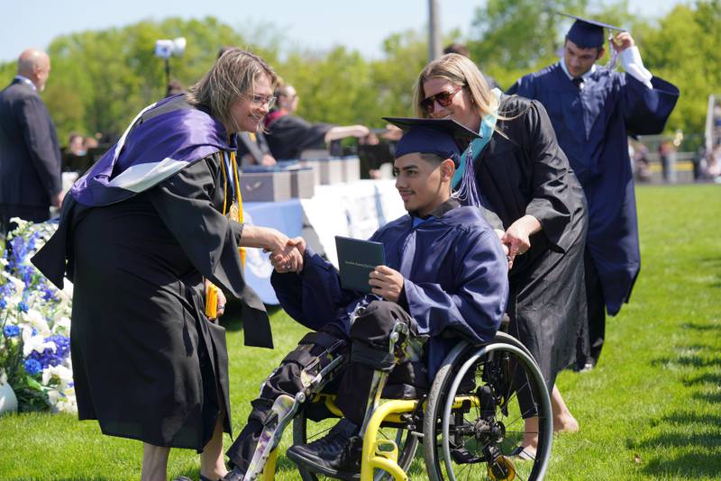 Members of the Cary-Grove High School class of 2026 celebrate their commencement on May 16, 2026.