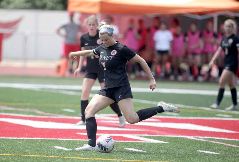 Benet’s Brinkley Douglas kicks the ball during a Class 2A girls state soccer semifinal against Crystal Lake Central at North Central College in Naperville on Friday, June 2, 2023.