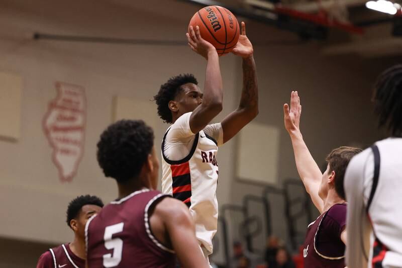 Bolingbrook’s Mekhi Cooper puts up a shot against Lockport on Friday, February 10th.