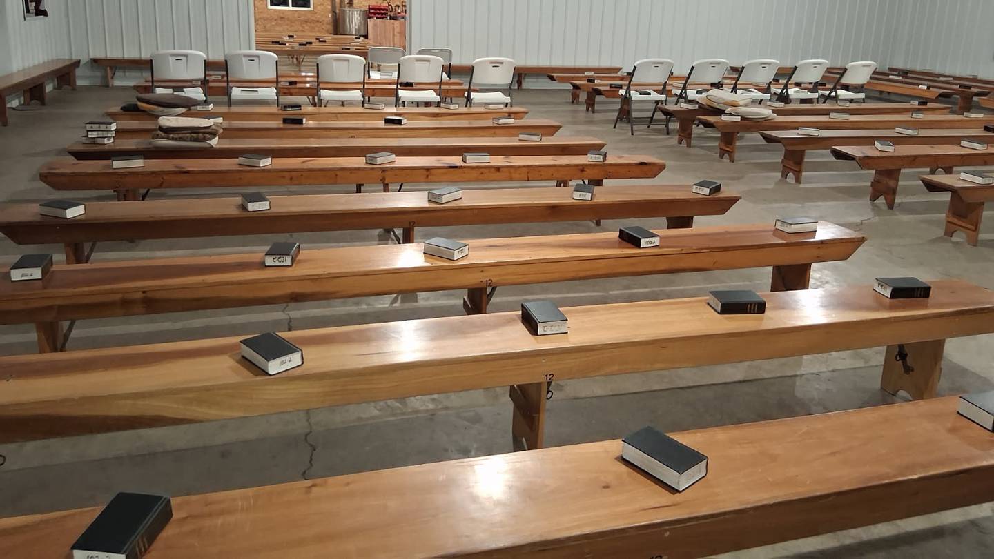 Benches are set for the communion church service.