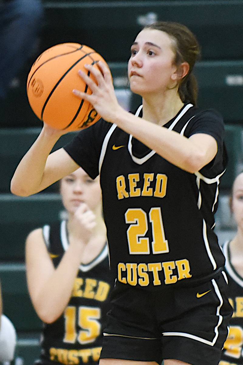 Reed-Custer's Alyssa Wollenzein shoots a 3-pointer during an IHSA Class 2A Coal City Regional semifinal against Coal City Tuesday, Feb. 18, 2025.
