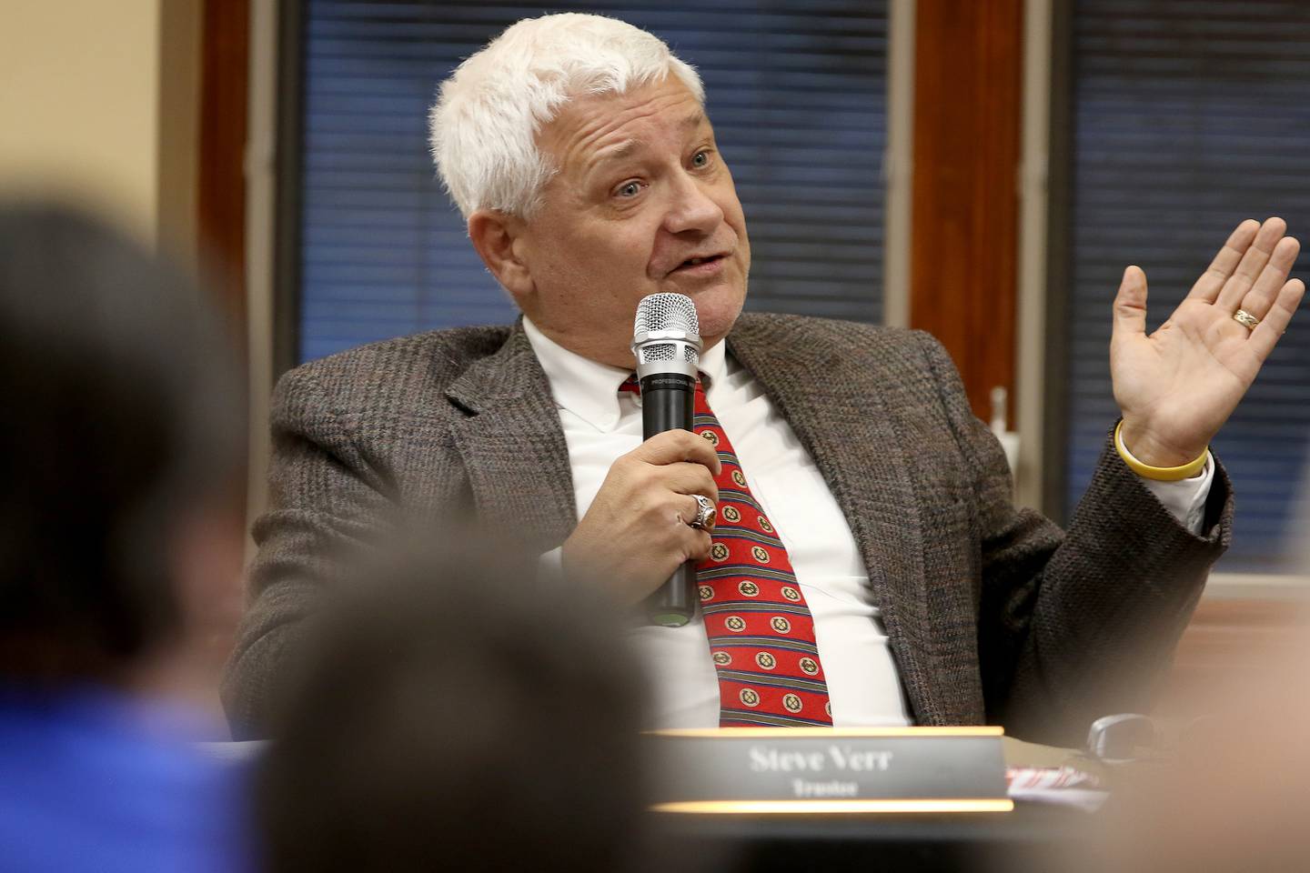 McHenry Township trustee Steve Verr addresses the crowd conduct a special meeting to award a contract to Urban Analytics and remove insurance from McHenry Township officials and their families on Friday, Dec. 20, 2019 in Johnsburg.