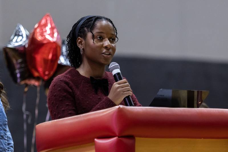 Nylon Joyce introduces some of the special guests in attendance at the surprise assembly during which Dr. Jaclyn Lennox, Bolingbrook High School’s assistant principal, was honored with the Milken Educator Award at Bolingbrook High School on Oct. 16, 2025.