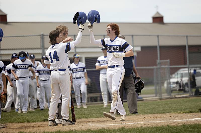 Burlington Central’s Michael Person (right) celebrates a home run against Sterling during a class 3A regional final in Rochelle Saturday, May 27, 2023.