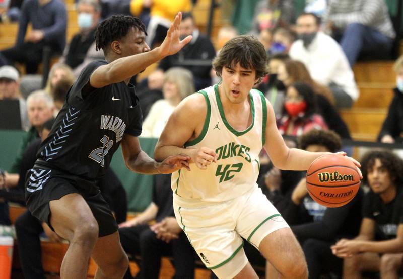 York’s Braden Richardson (42) drives toward the basket during a Class 4A Glenbard West Regional semifinal against Willowbrook in Glen Ellyn on Wednesday, Feb. 23, 2022.