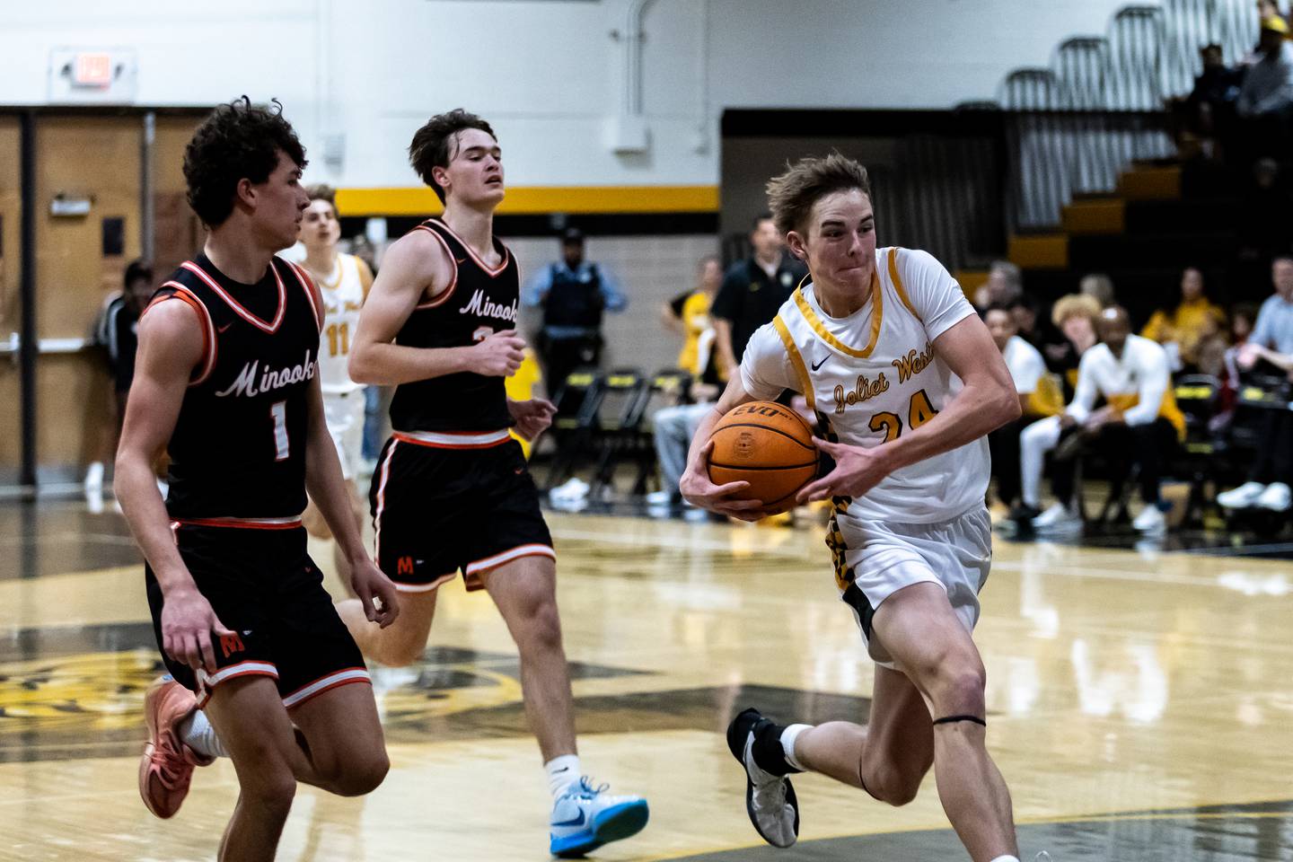 Joliet West's Ryan Lipke drives to the basket during a varsity boys basketball game against Minooka at Joliet West on Jan. 6, 2026.