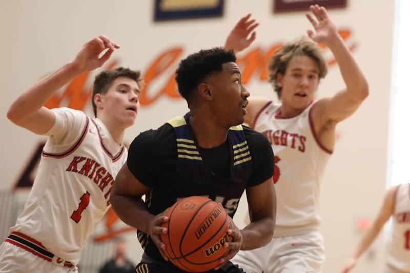 Lemont’s battles in the paint for a basket against Lincoln-Way Central in the Lincoln-Way West Warrior Showdown on Saturday January 28th, 2023.