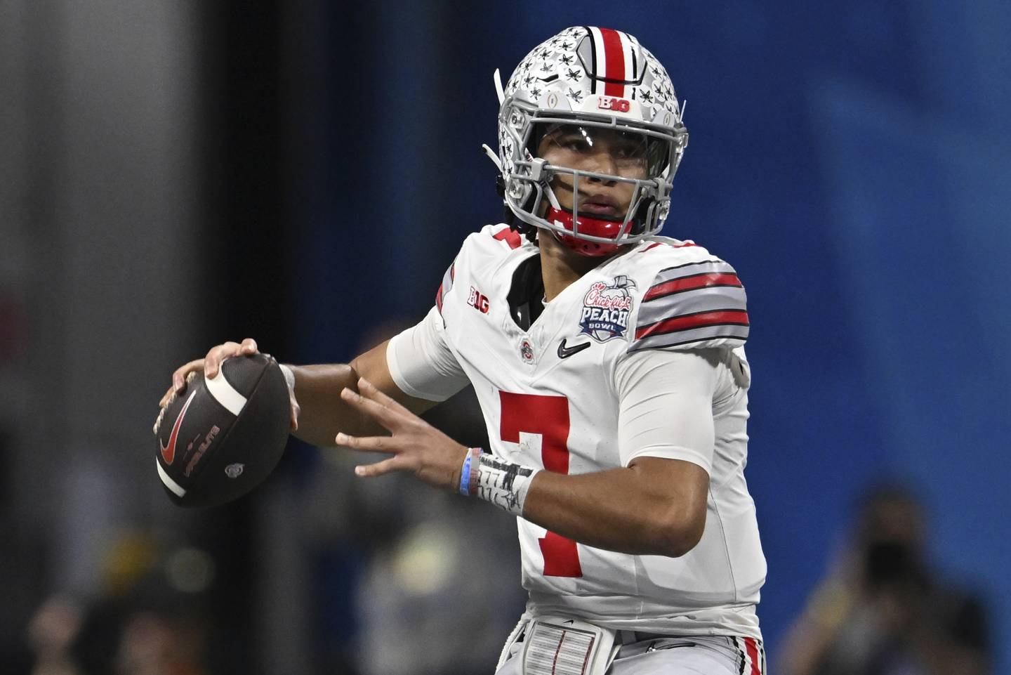 Ohio State quarterback C.J. Stroud passes against Georgia during the first half of the Peach Bowl, Saturday, Dec. 31, 2022, in Atlanta.