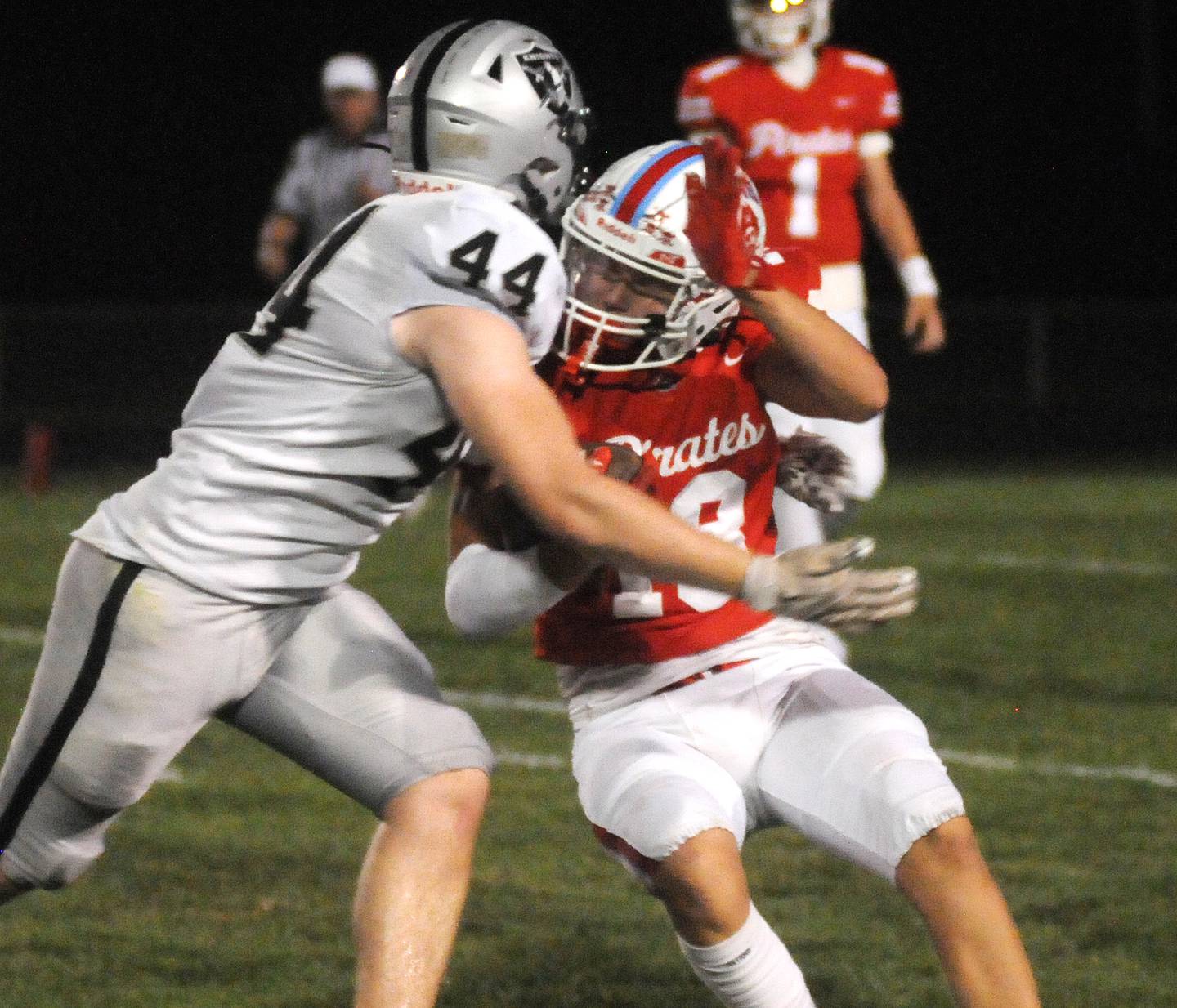 Kaneland's Roan O'Neil tackles Ottawa's Jack Pongracz at King Field on Friday, Sept. 20, 2024.