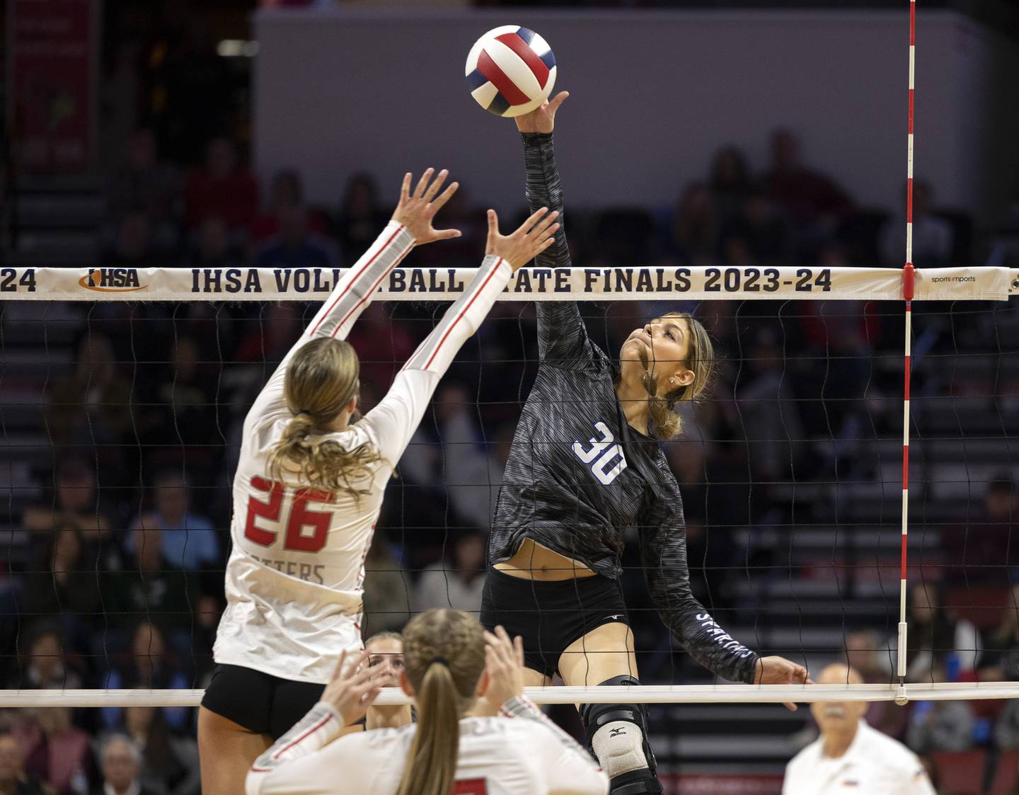 St. Francis’ Shay McMillen plays the ball against Morton’s Carly Whitaker n in the 3A state semifinal Friday, Nov. 10, 2023 at CEFCU Arena in Normal.